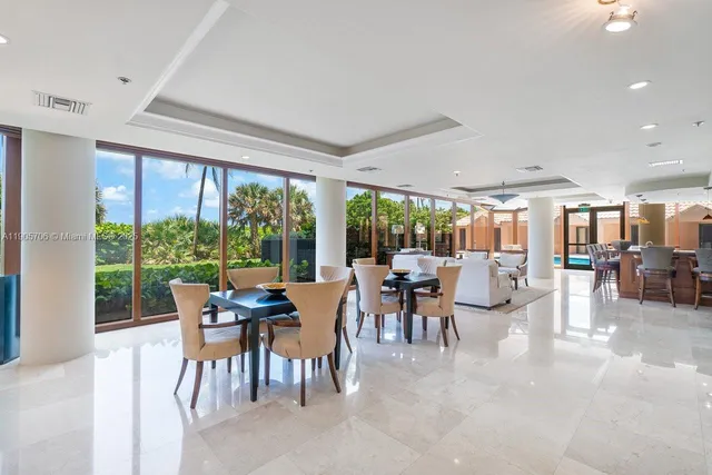 a view of a swimming pool with a lounge chairs