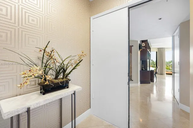 a kitchen with kitchen island granite countertop a sink and a counter top space