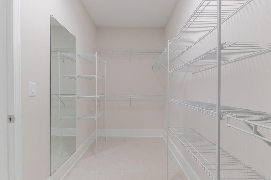 601 Cork Street Woodstock, GA 30188 - Photo 32 of 52 a bathroom with a shower