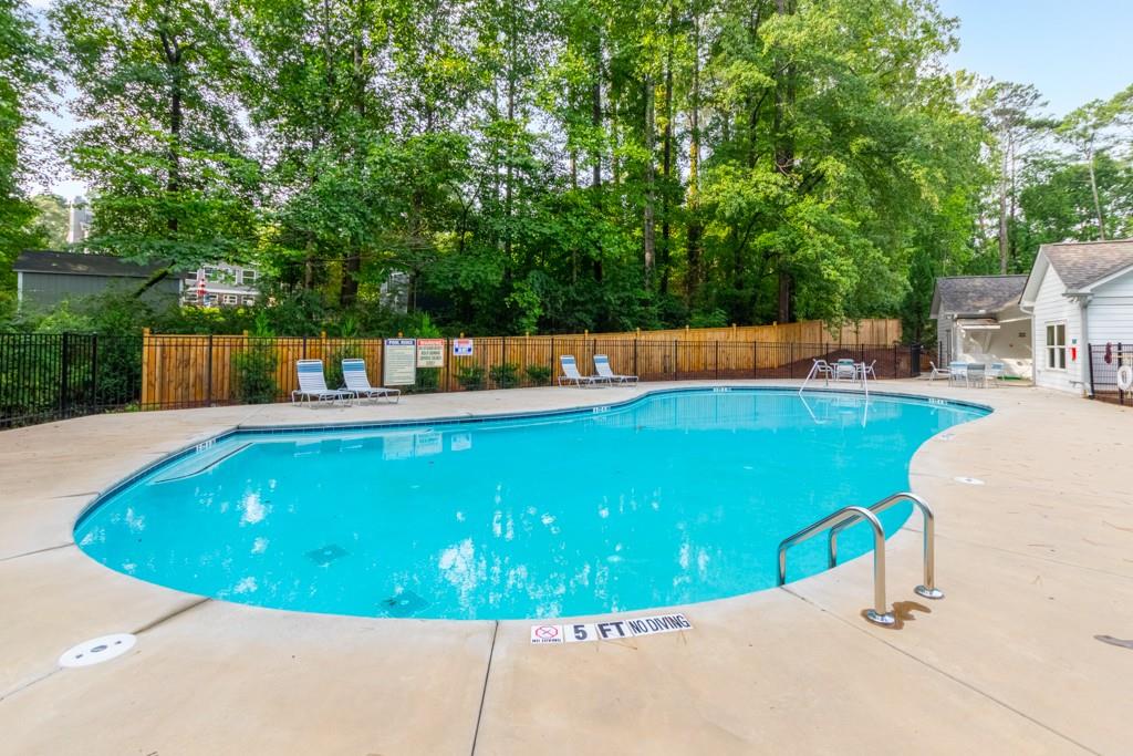 601 Cork Street Woodstock, GA 30188 - Photo 51 of 52 a view of a swimming pool with a patio