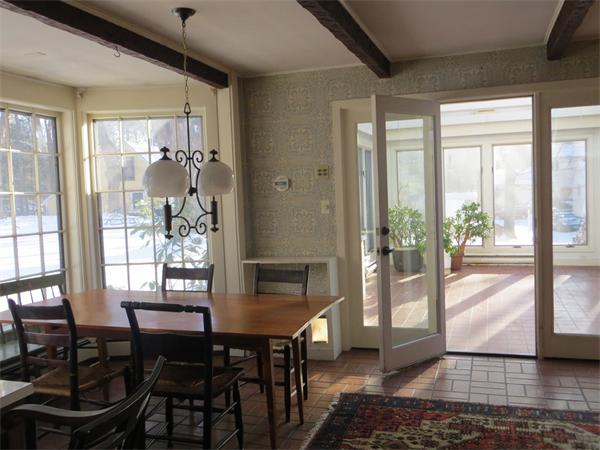 151 Edgell Road Framingham, MA 01701 - Photo 13 of 27 a view of a dining room with furniture and a window