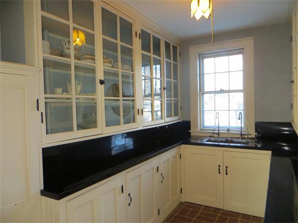 151 Edgell Road Framingham, MA 01701 - Photo 17 of 27 a kitchen with a sink and a window