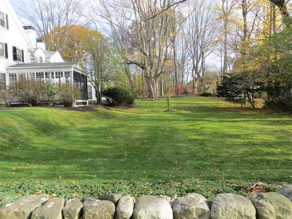 151 Edgell Road Framingham, MA 01701 - Photo 2 of 27 a view of a garden with a house
