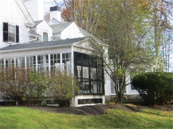 151 Edgell Road Framingham, MA 01701 - Photo 4 of 27 front view of house with a yard