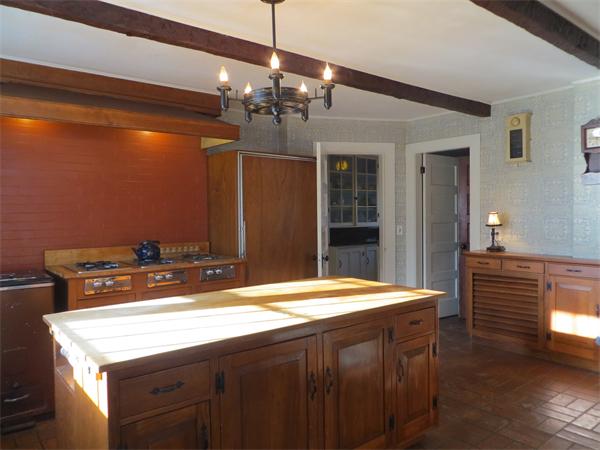 151 Edgell Road Framingham, MA 01701 - Photo 9 of 27 a room with a chandelier and wooden floors