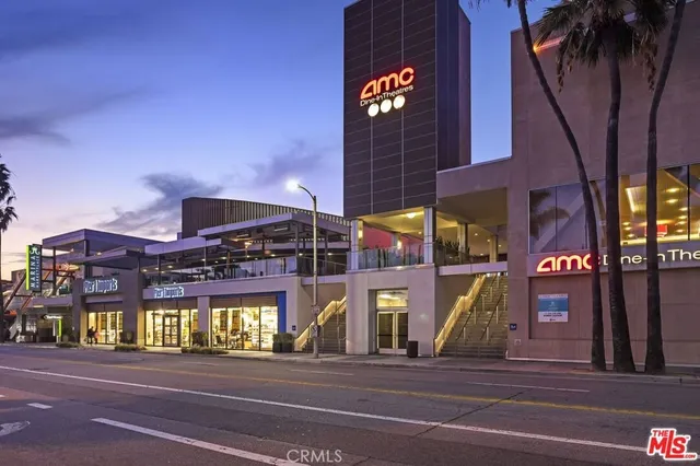a view of a building with a street