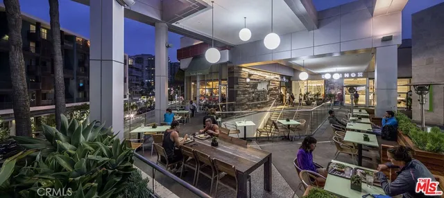 a view of a house with a potted plant