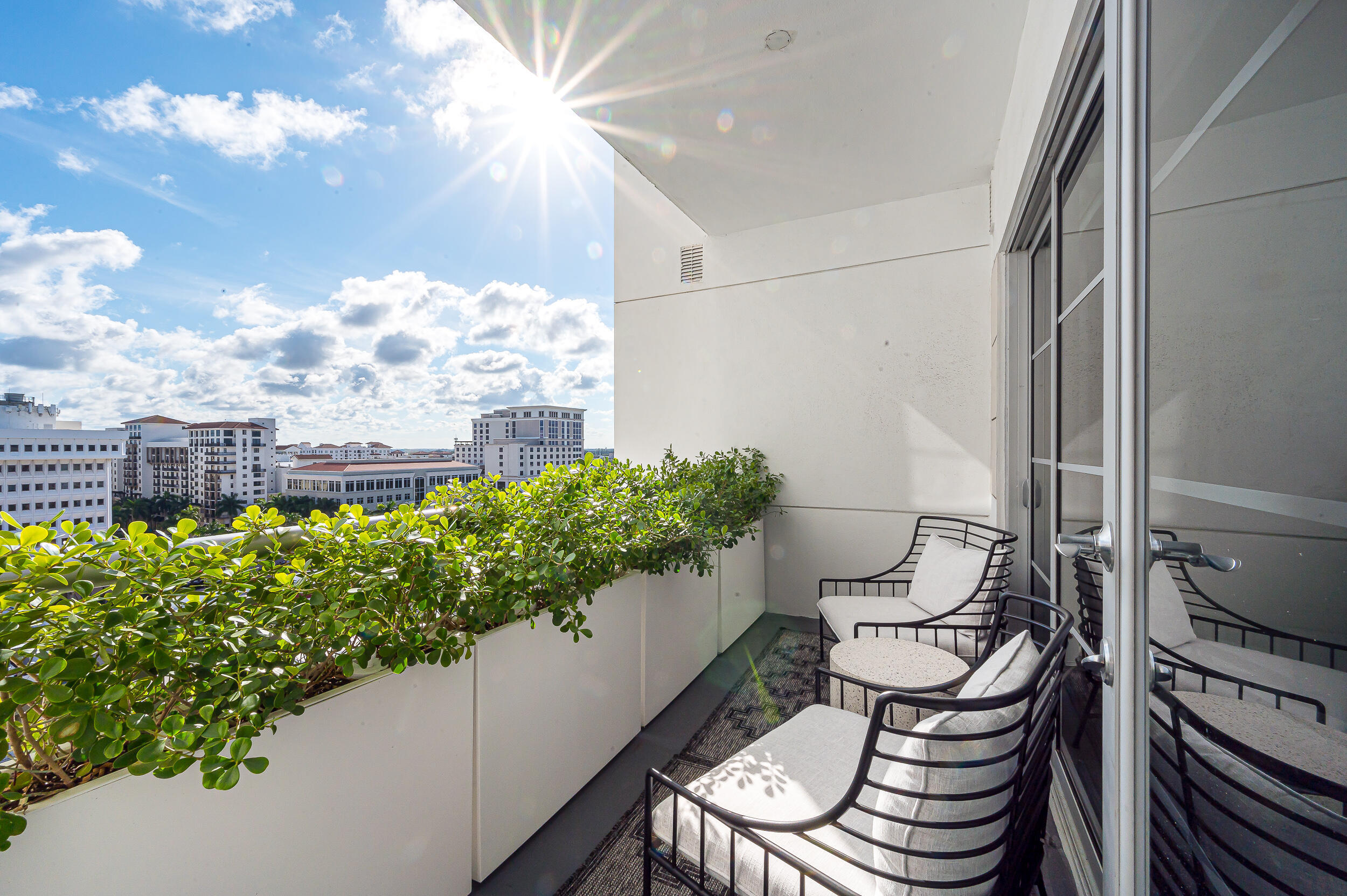 155 East Boca Raton Road, Unit 1008 Boca Raton, FL 33432 - Photo 15 of 42 a view of a balcony with chairs