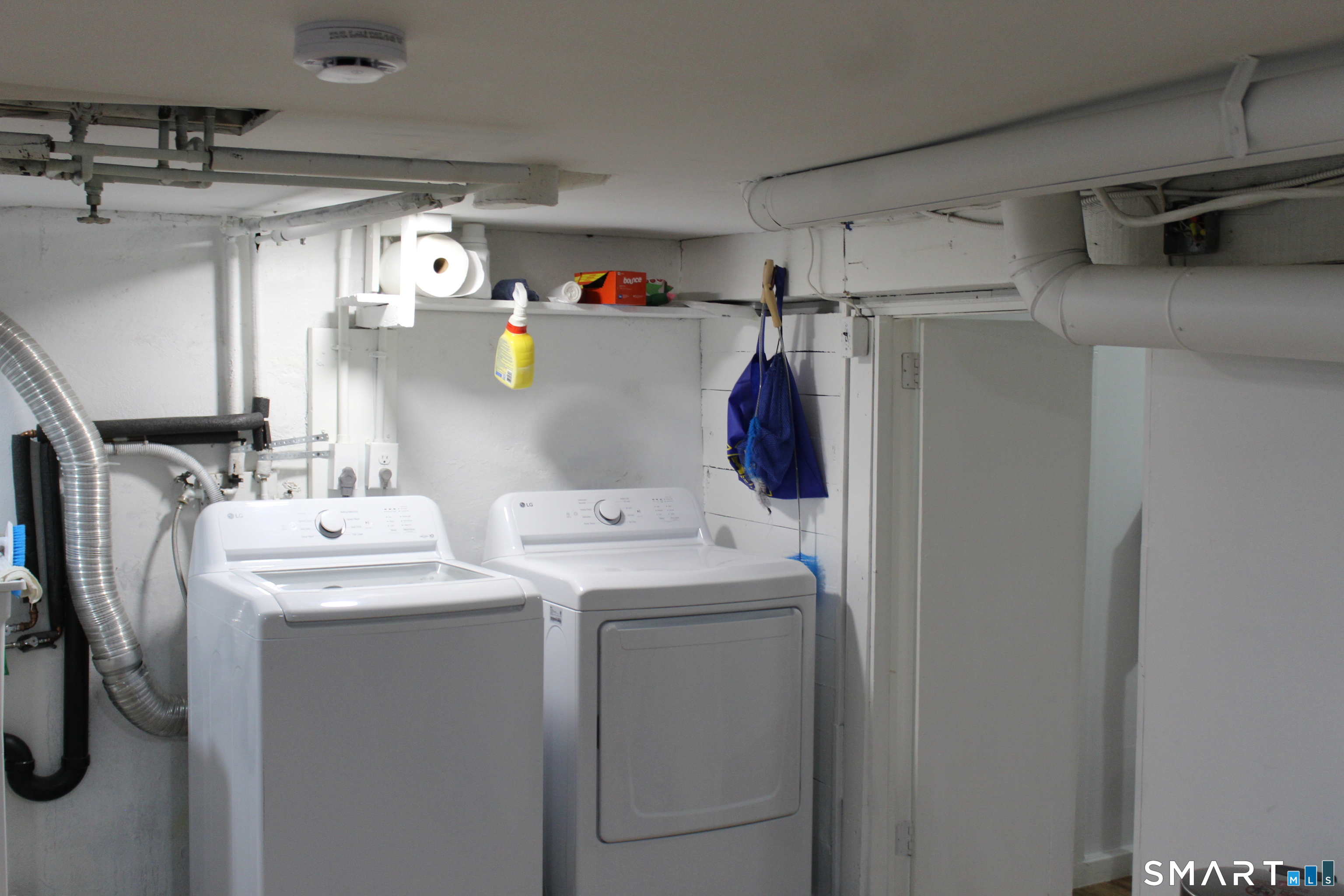 83 Faneuil Street Windsor, CT 06095 - Photo 12 of 14 a utility room with dryer and washer