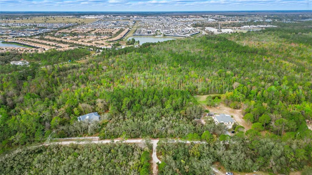 Thacker Trail Kissimmee, FL 34747 - Photo 2 of 11 a view of a yard with an outdoor space