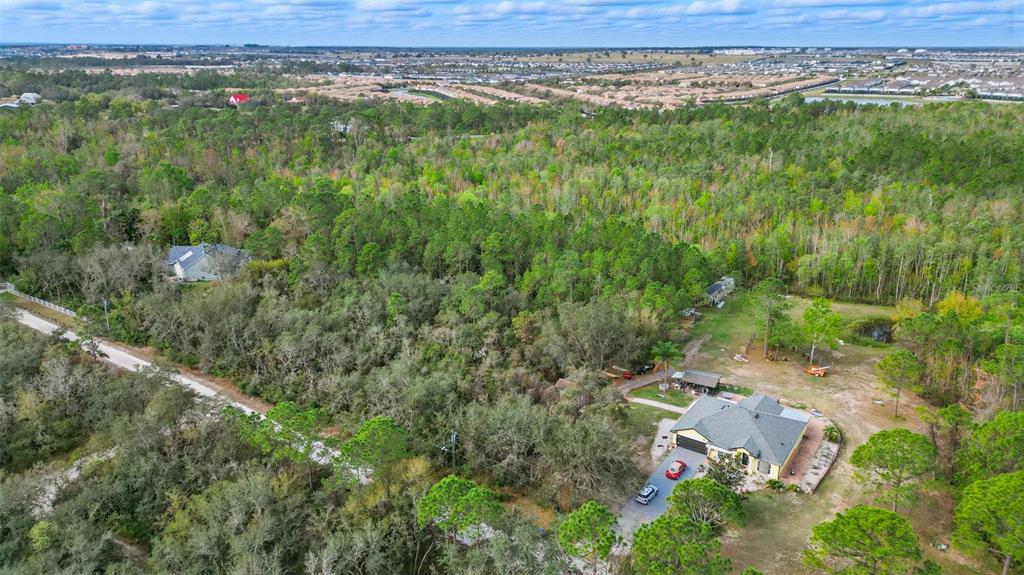 Thacker Trail Kissimmee, FL 34747 - Photo 8 of 11 an aerial view of a city