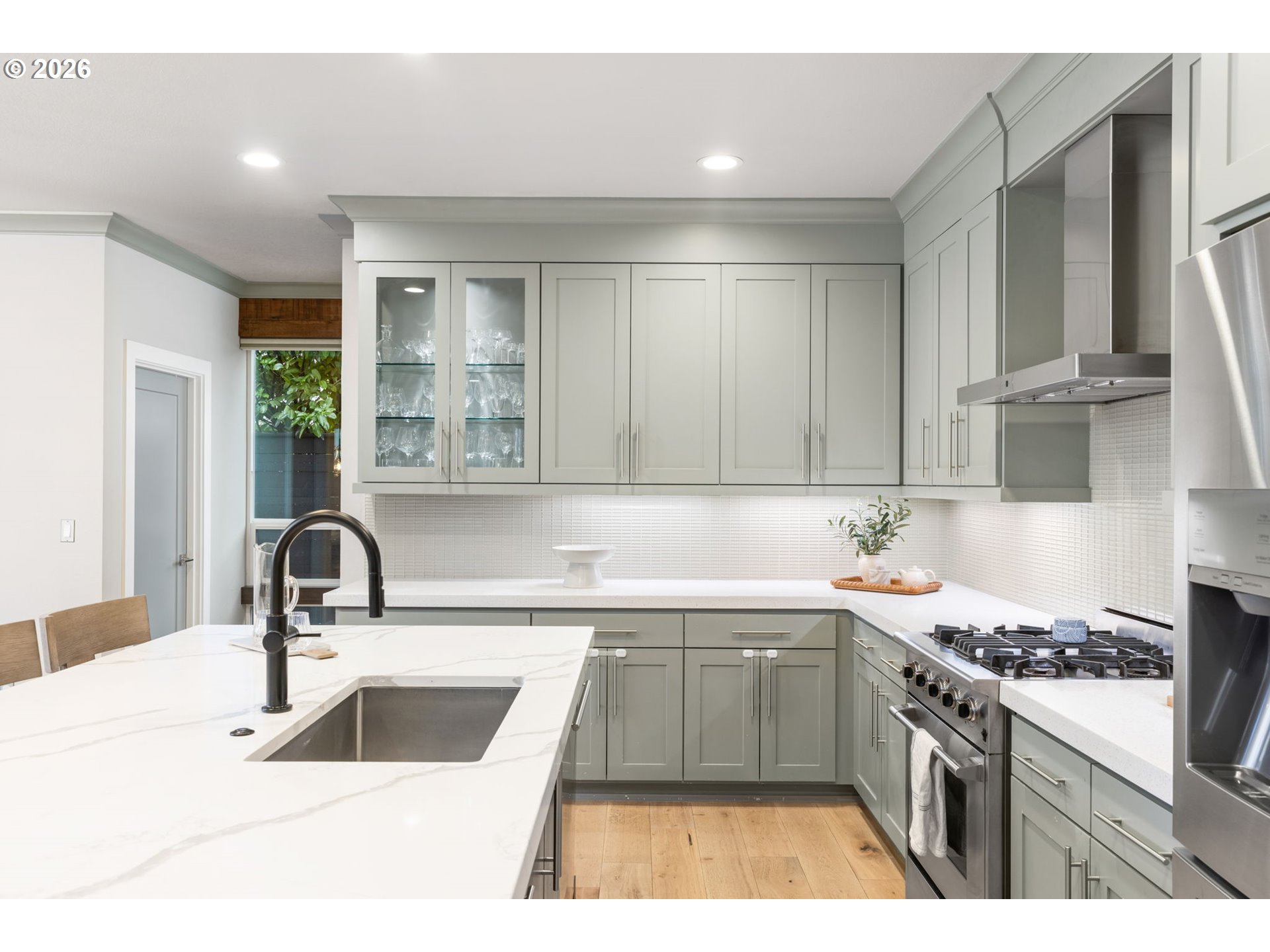 2025 North Alberta Street Portland, OR 97217 - Photo 20 of 48 a kitchen with a sink stove and cabinets