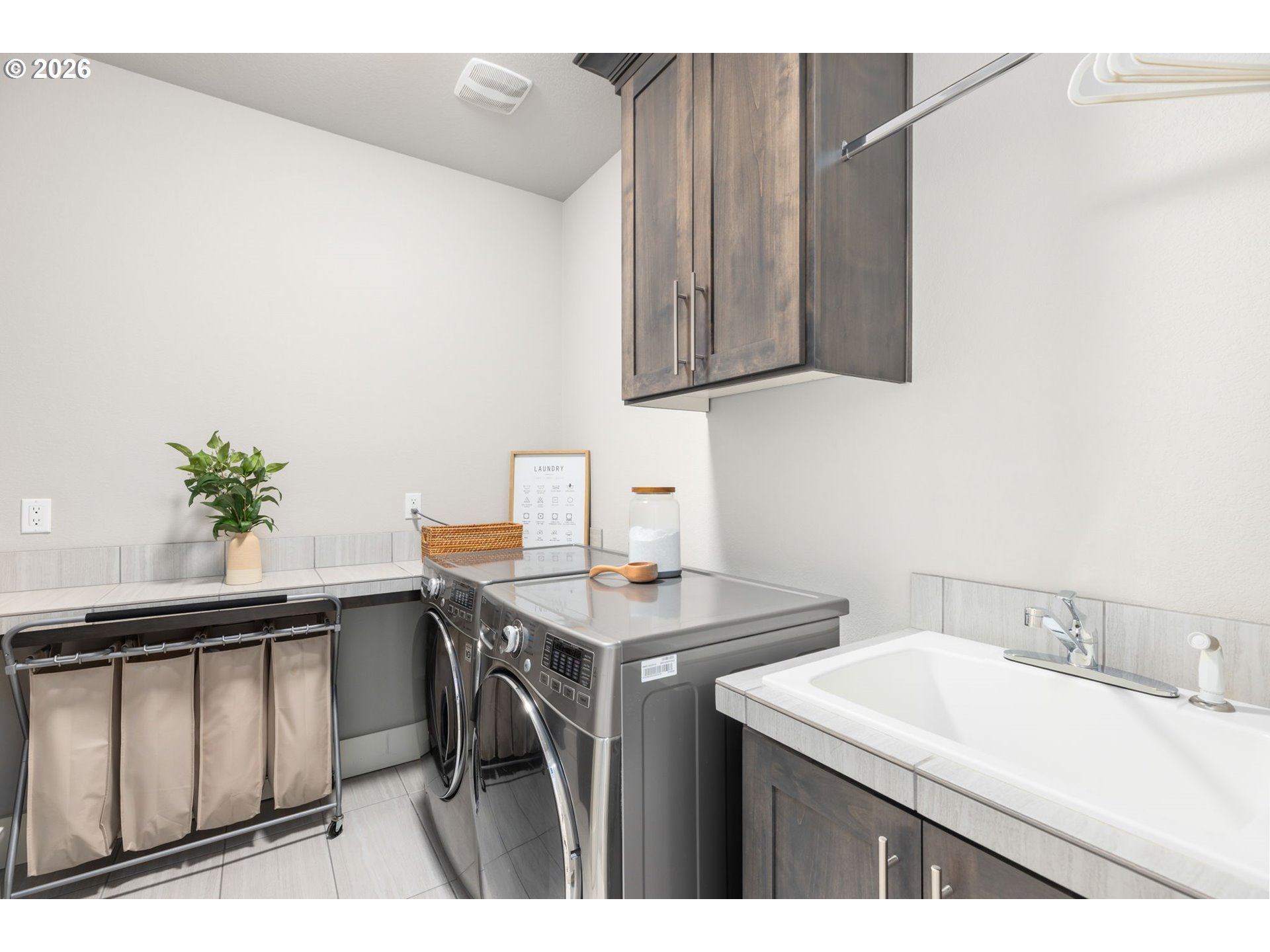 2025 North Alberta Street Portland, OR 97217 - Photo 38 of 48 a kitchen with a sink cabinets and utility