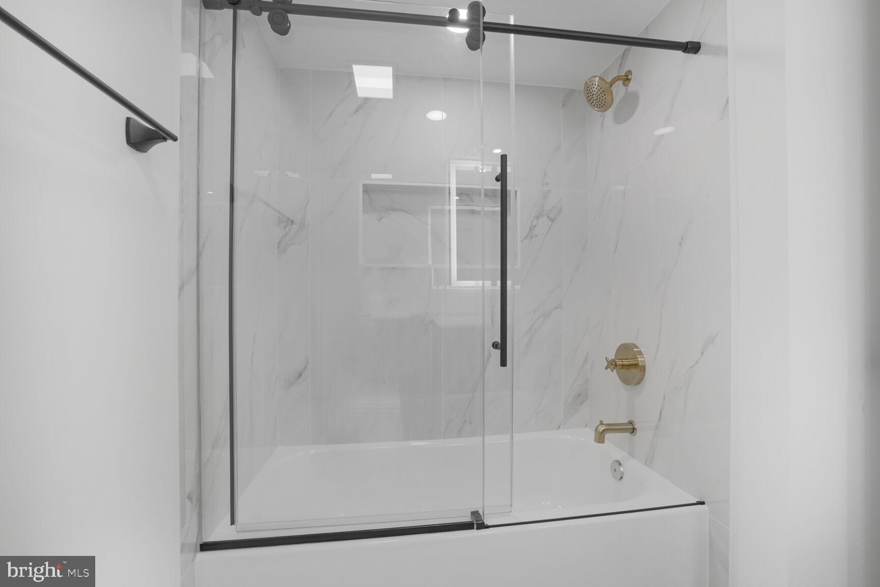 4550 North Park Avenue, Unit 707 Chevy Chase, MD 20815 - Photo 12 of 15 a bathroom with a shower