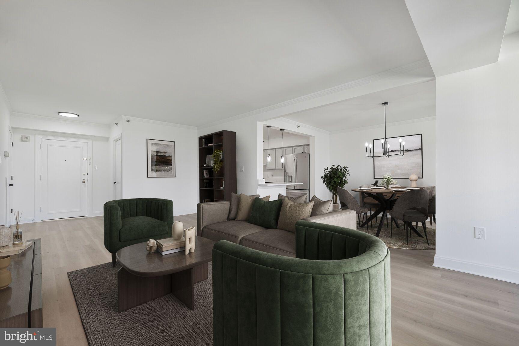 4550 North Park Avenue, Unit 707 Chevy Chase, MD 20815 - Photo 2 of 15 a living room with furniture and a chair