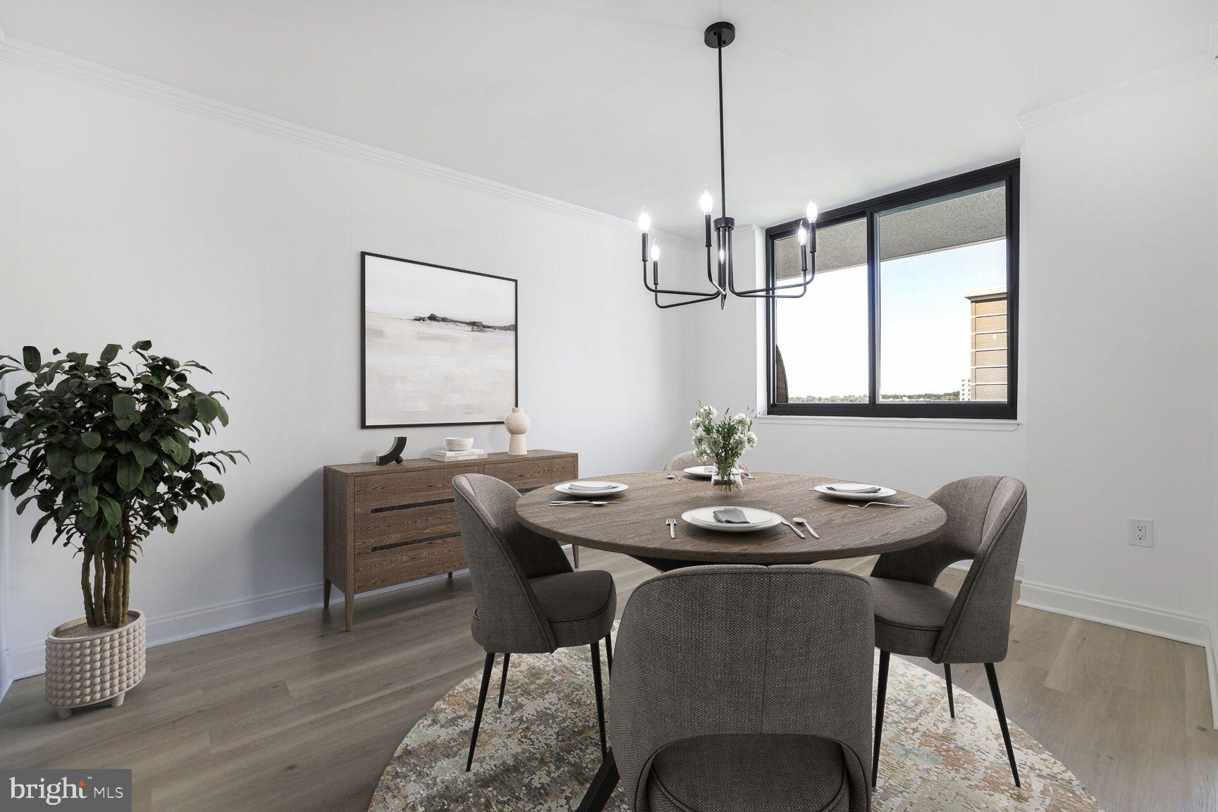4550 North Park Avenue, Unit 707 Chevy Chase, MD 20815 - Photo 4 of 15 a view of a dining room with furniture and wooden floor