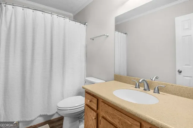 a bathroom with a sink and a toilet