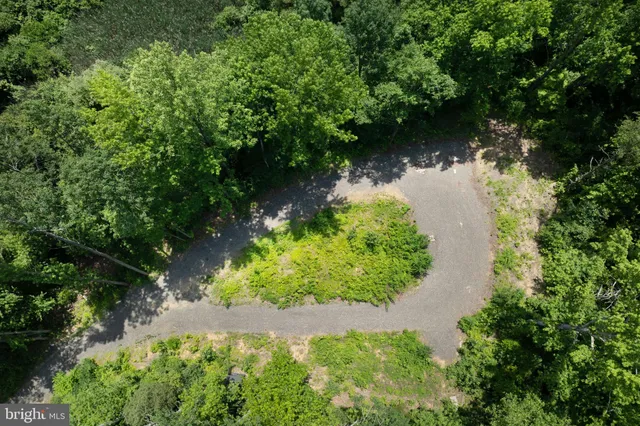 a view of a lake with a house
