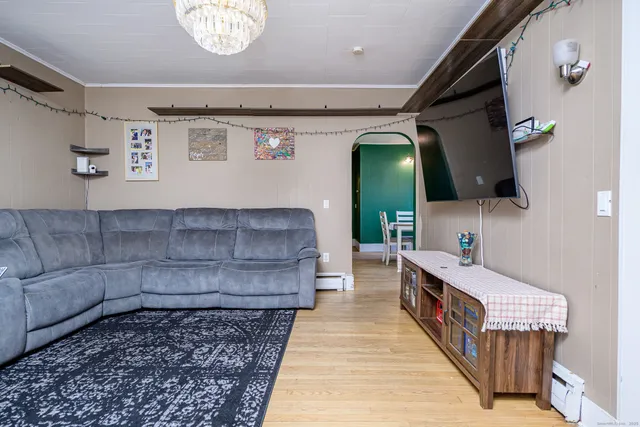 a bathroom with a bathtub and a mirror