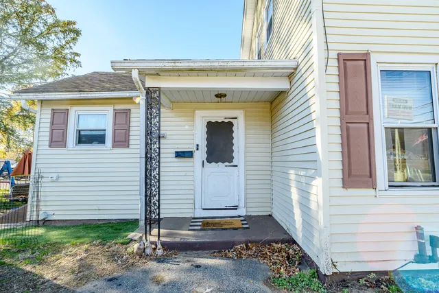 a front view of a house with garage