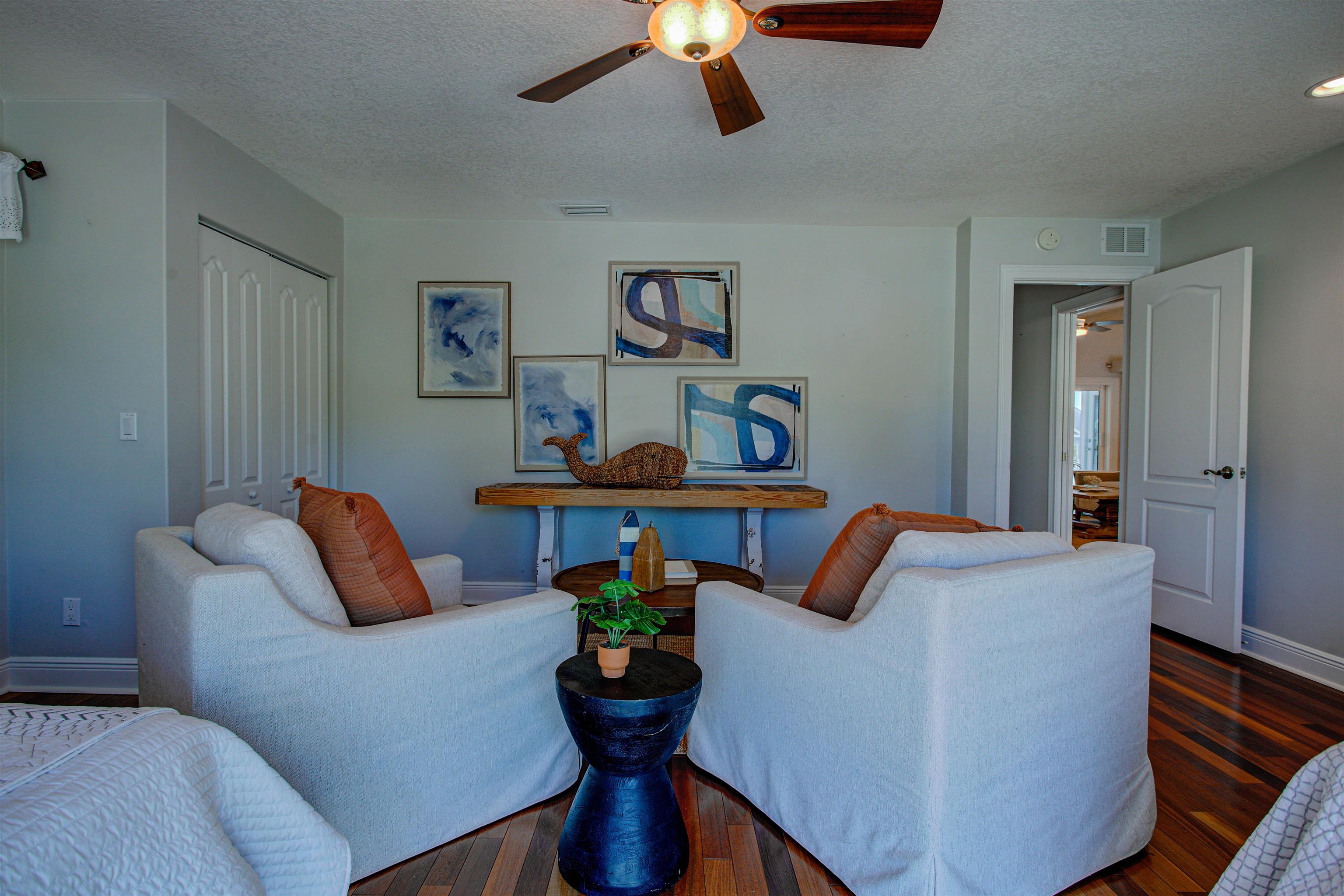 9151 June Lane St. Augustine, FL 32080 - Photo 24 of 73 a living room with furniture and a lamp