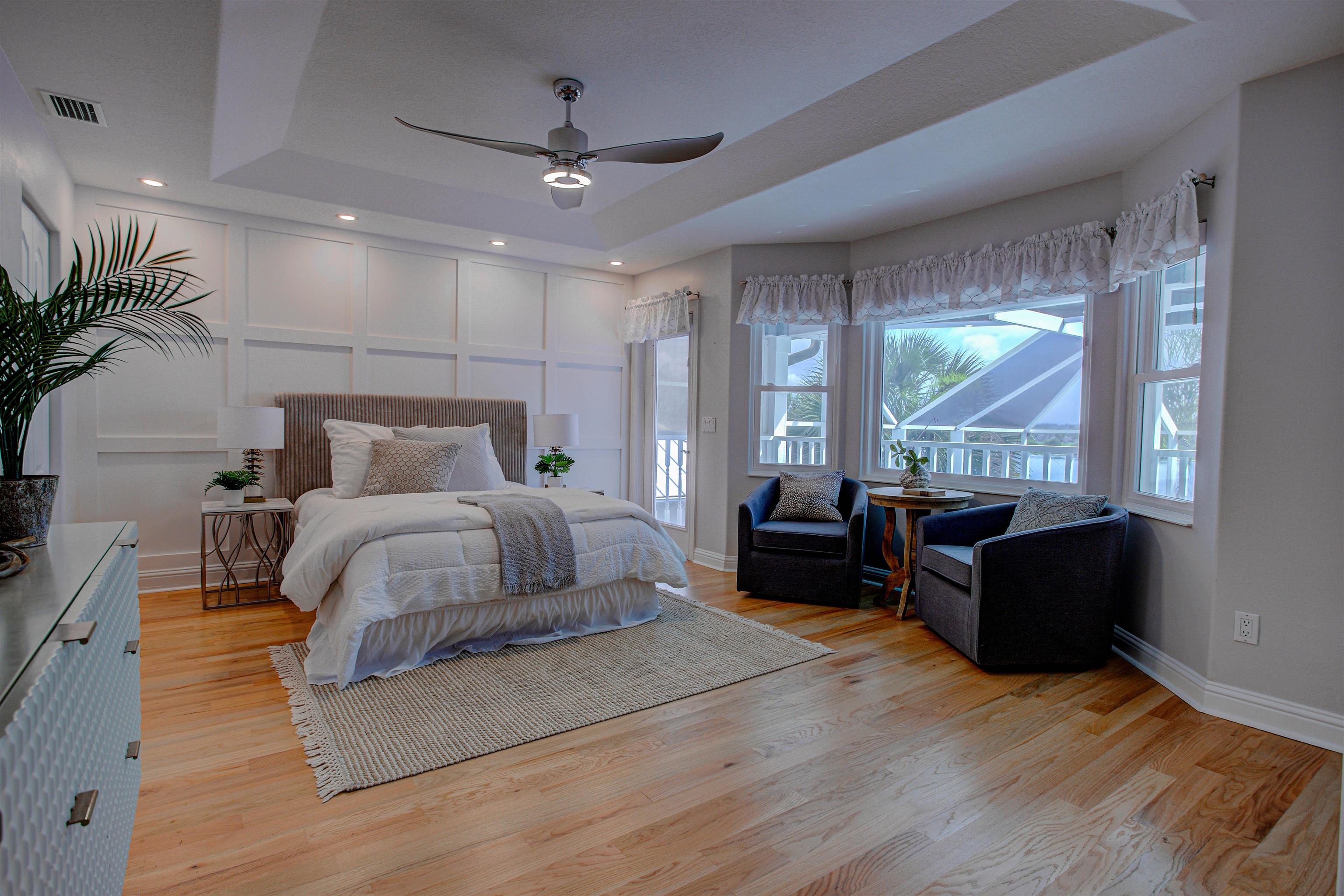 9151 June Lane St. Augustine, FL 32080 - Photo 29 of 73 a living room with furniture and a large window