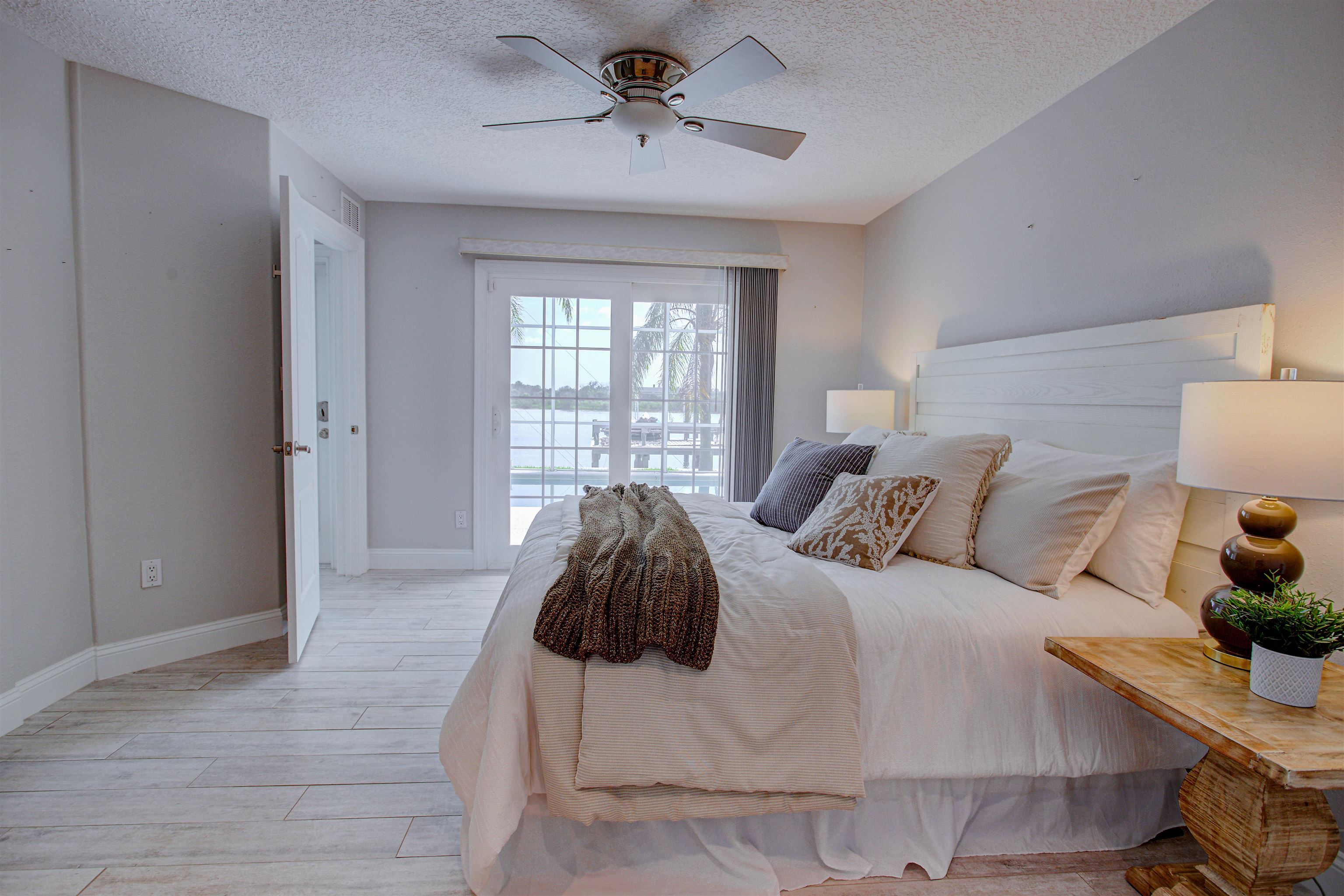 9151 June Lane St. Augustine, FL 32080 - Photo 53 of 73 a bedroom with a bed and window