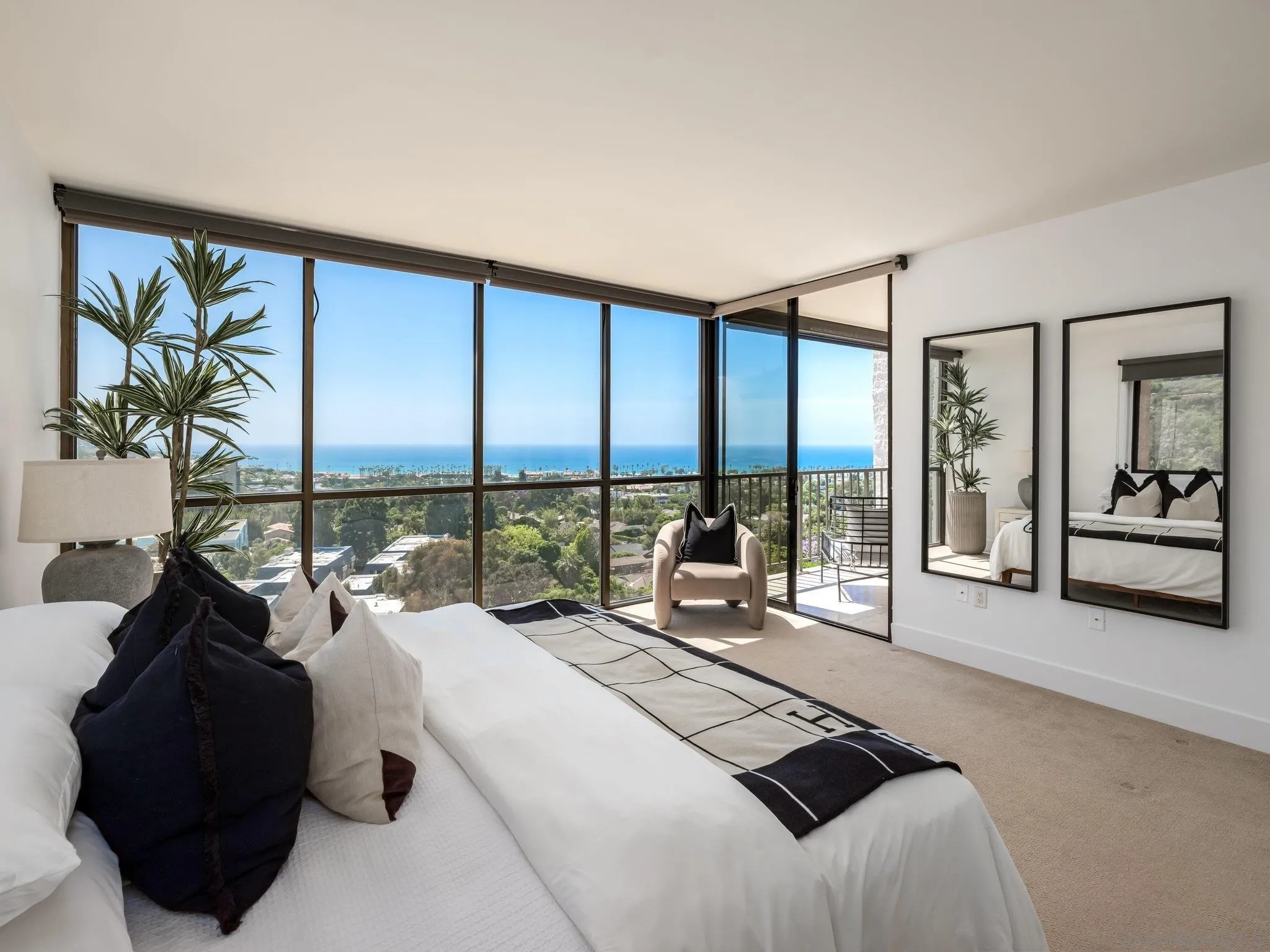 2500 Torrey Pines Road, Unit 1001 La Jolla, CA 92037 - Photo 13 of 30 a bed room with a bed and a large window