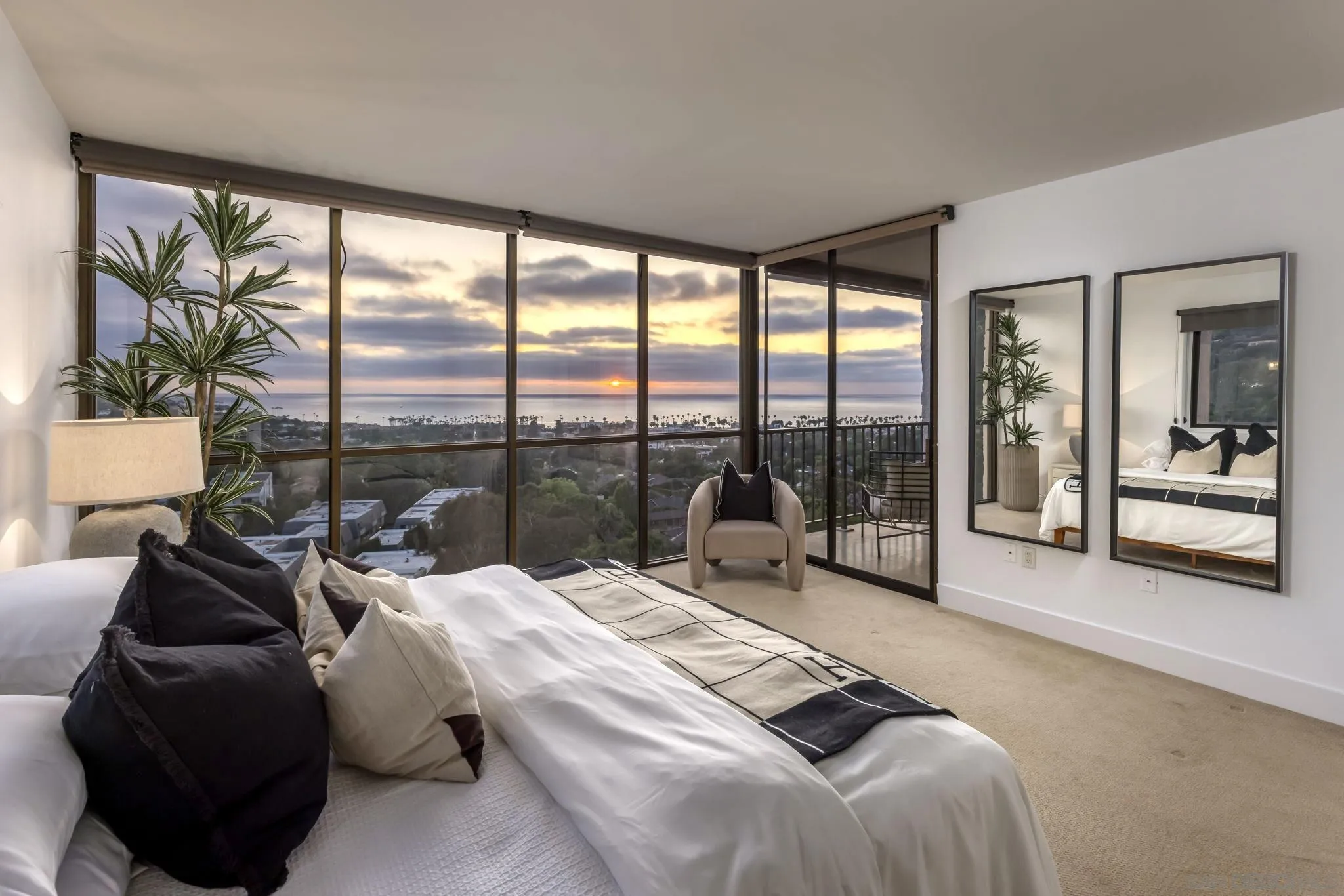 2500 Torrey Pines Road, Unit 1001 La Jolla, CA 92037 - Photo 14 of 30 a bedroom with a bed and large glass window