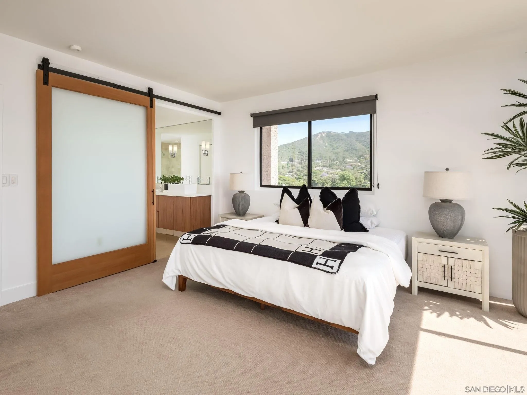 2500 Torrey Pines Road, Unit 1001 La Jolla, CA 92037 - Photo 16 of 30 a bedroom with bed and window