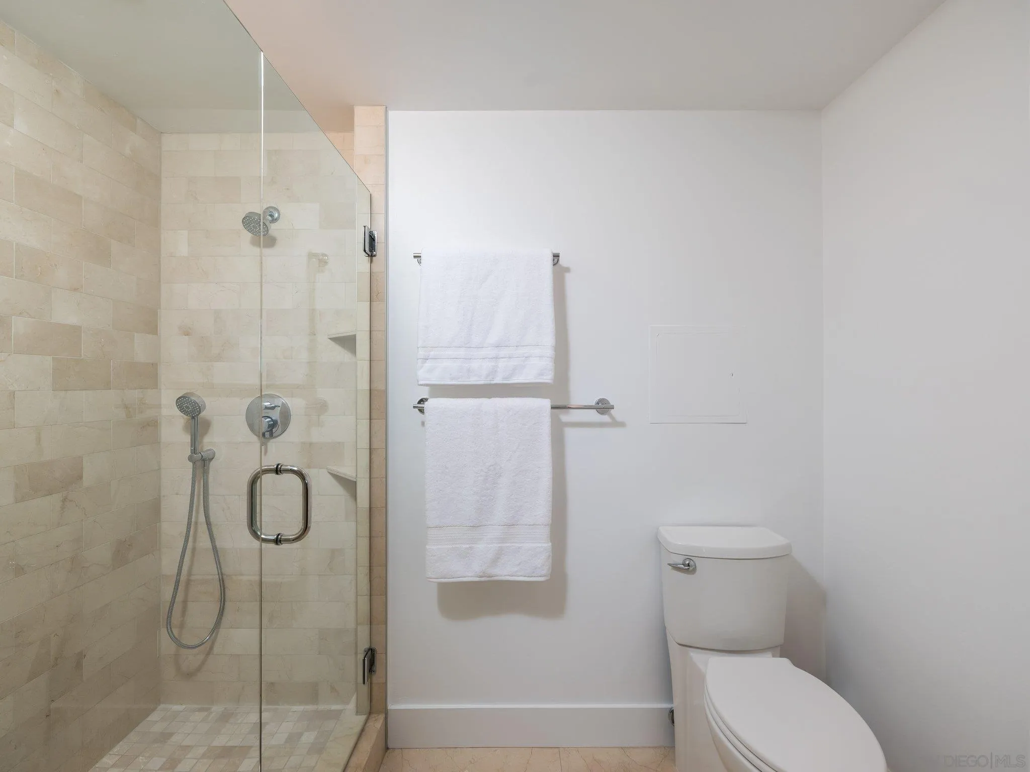 2500 Torrey Pines Road, Unit 1001 La Jolla, CA 92037 - Photo 19 of 30 a bathroom with a toilet and a shower