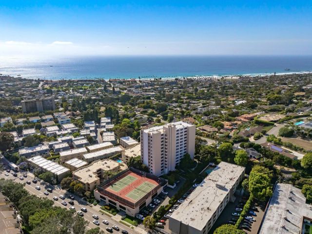 an aerial view of a city with lots of residential buildings