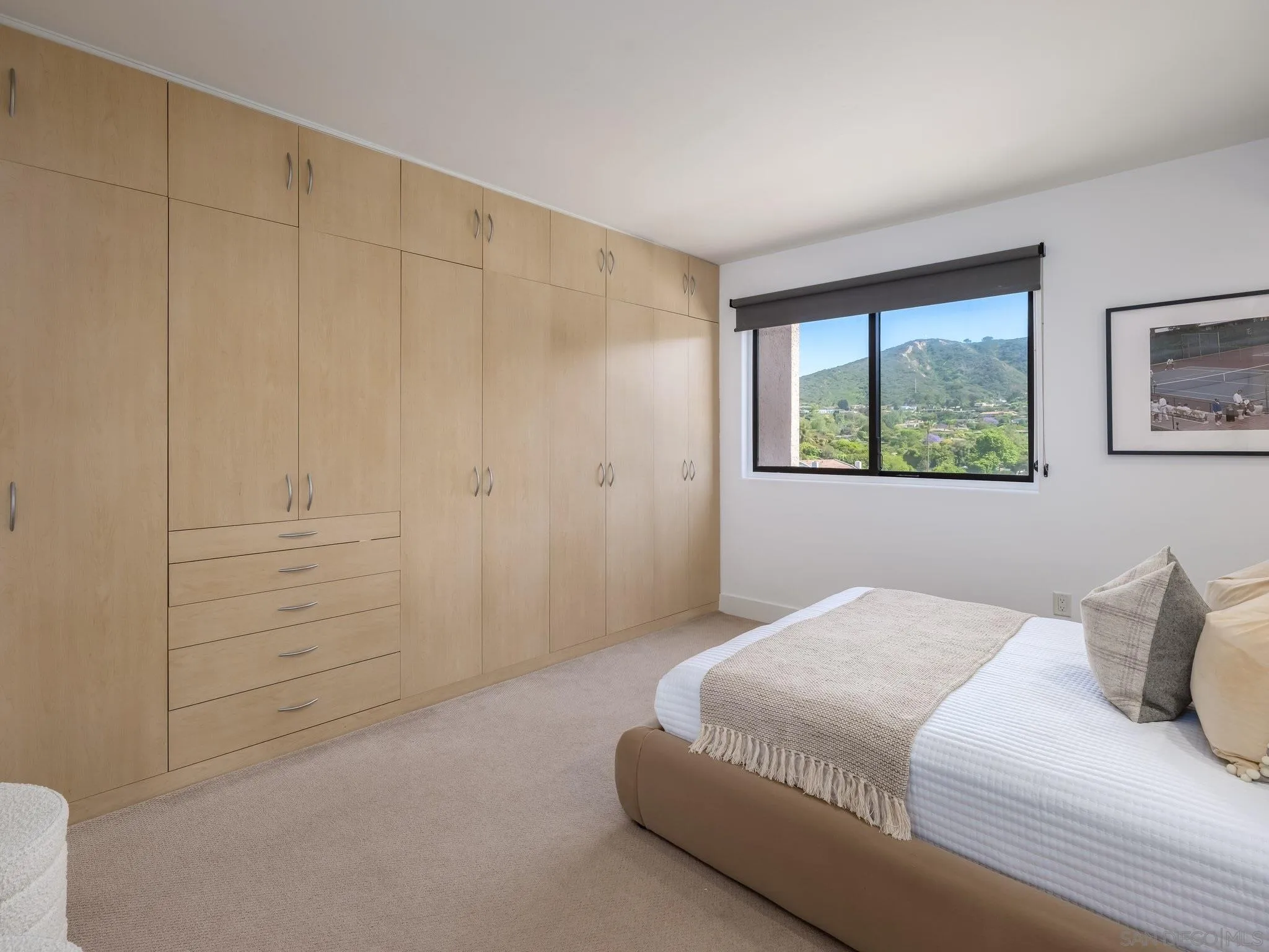 2500 Torrey Pines Road, Unit 1001 La Jolla, CA 92037 - Photo 23 of 30 a bedroom with a bed and a window