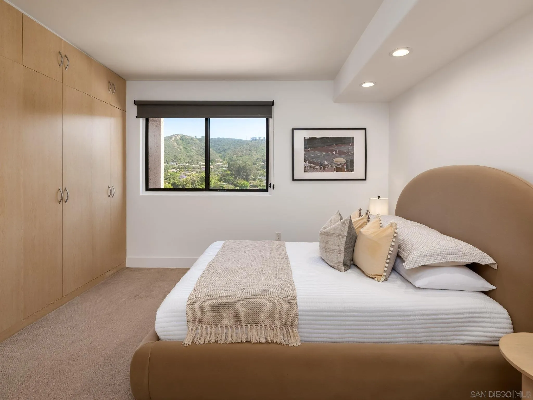 2500 Torrey Pines Road, Unit 1001 La Jolla, CA 92037 - Photo 24 of 30 a bedroom with a bed and a window