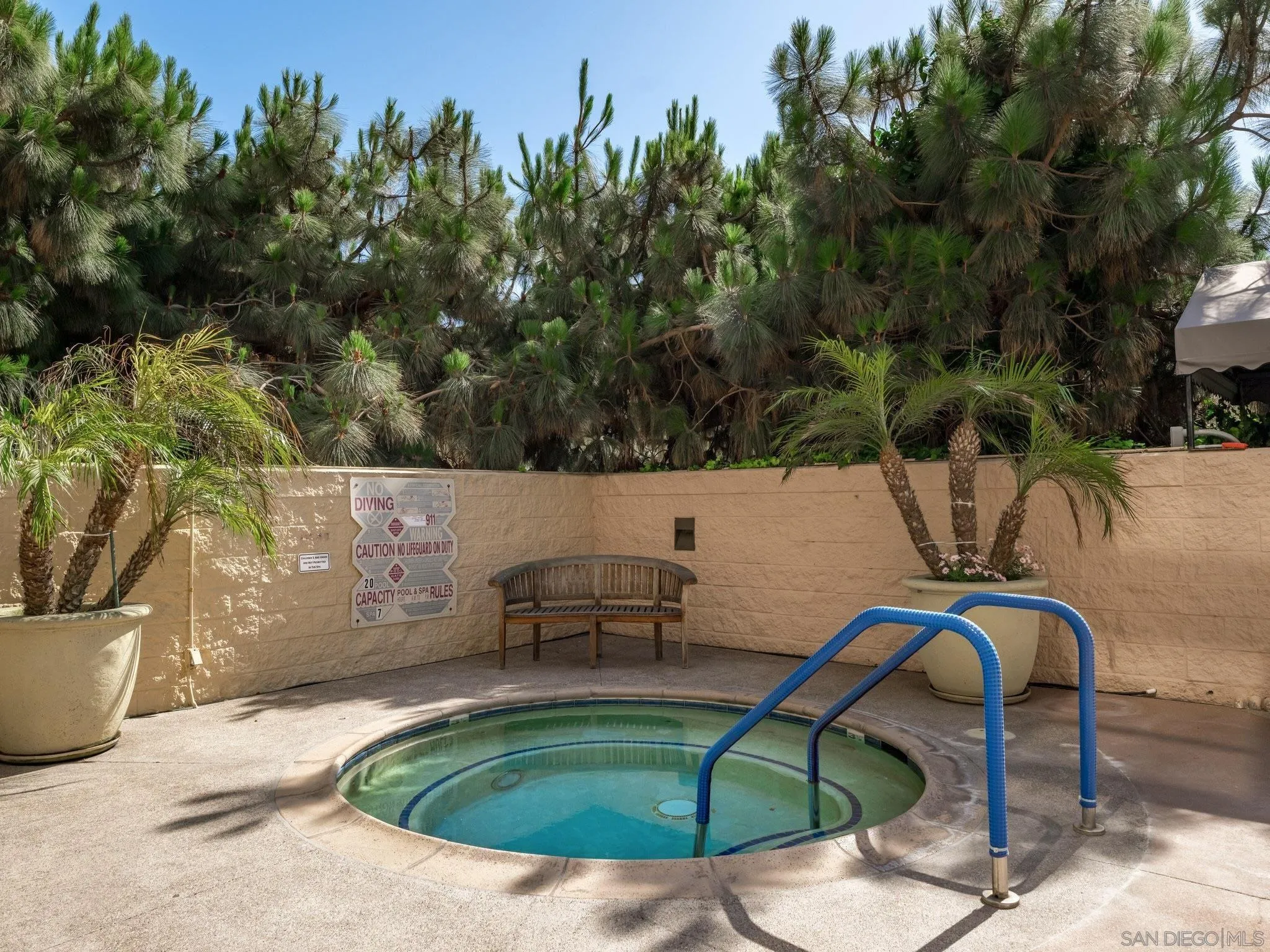 2500 Torrey Pines Road, Unit 1001 La Jolla, CA 92037 - Photo 29 of 30 a view of a swimming pool with a patio