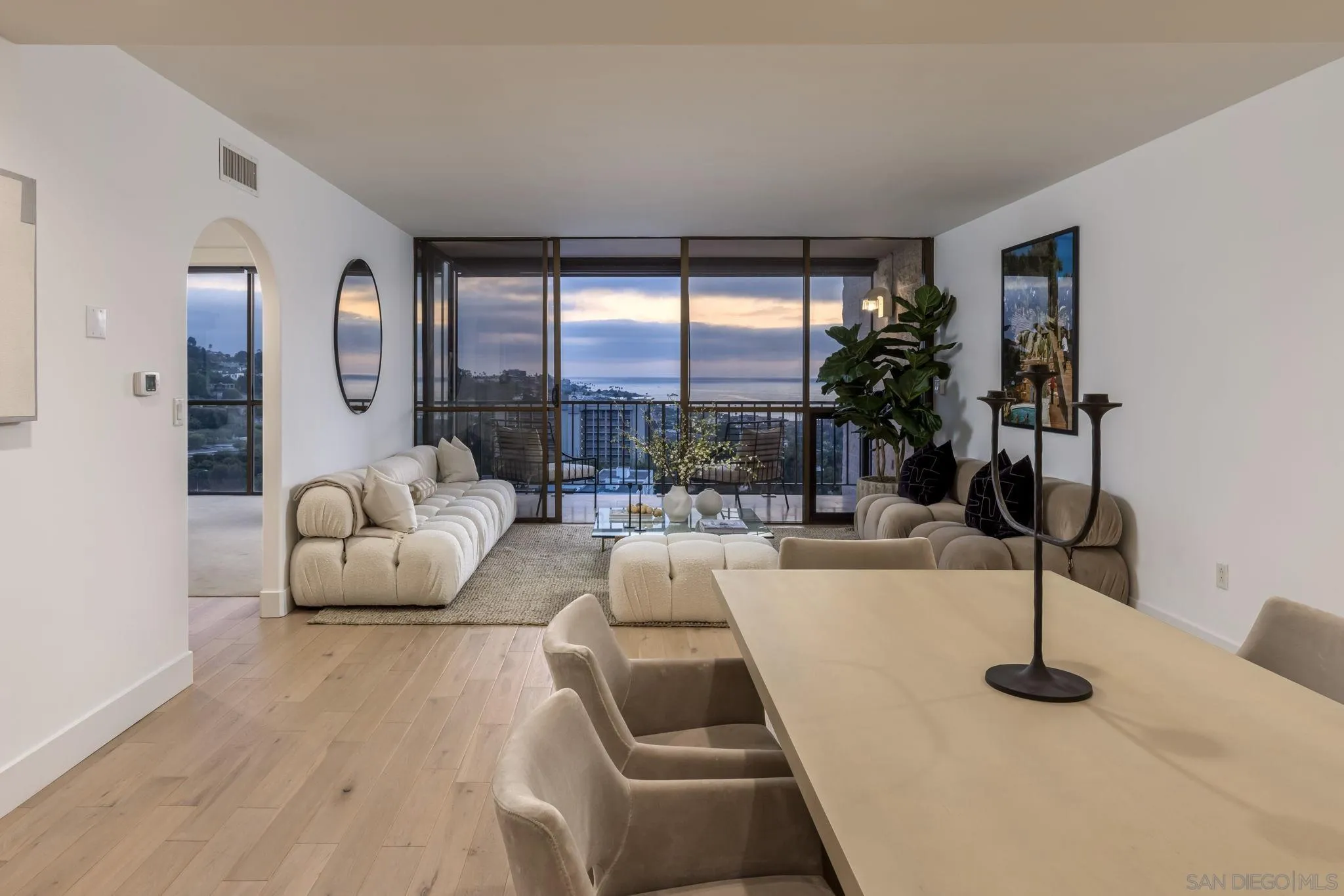 2500 Torrey Pines Road, Unit 1001 La Jolla, CA 92037 - Photo 4 of 30 a living room with furniture and a large window