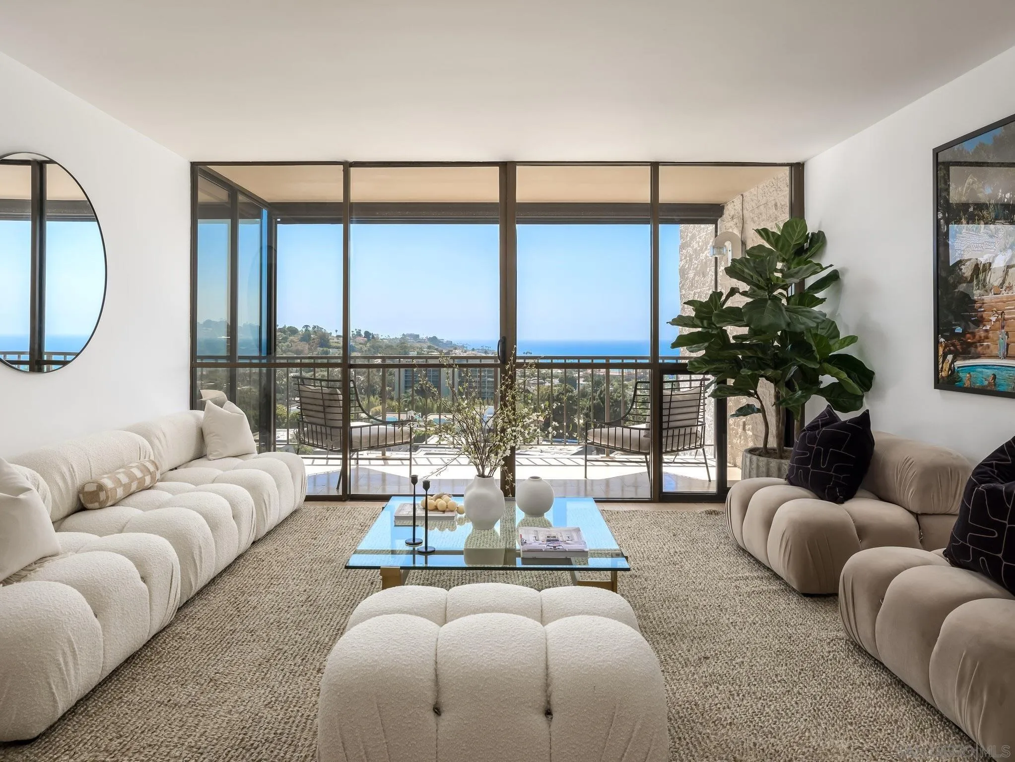 2500 Torrey Pines Road, Unit 1001 La Jolla, CA 92037 - Photo 5 of 30 a living room with furniture and a large window