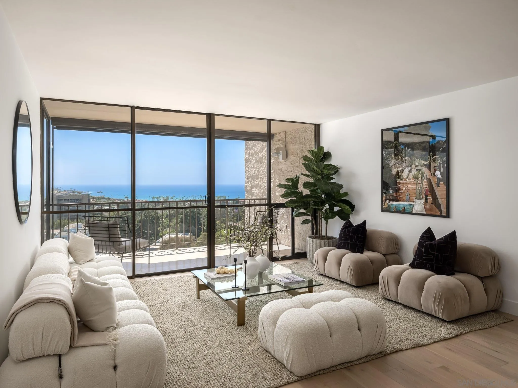 2500 Torrey Pines Road, Unit 1001 La Jolla, CA 92037 - Photo 6 of 30 a living room with furniture and a large window with balcony view