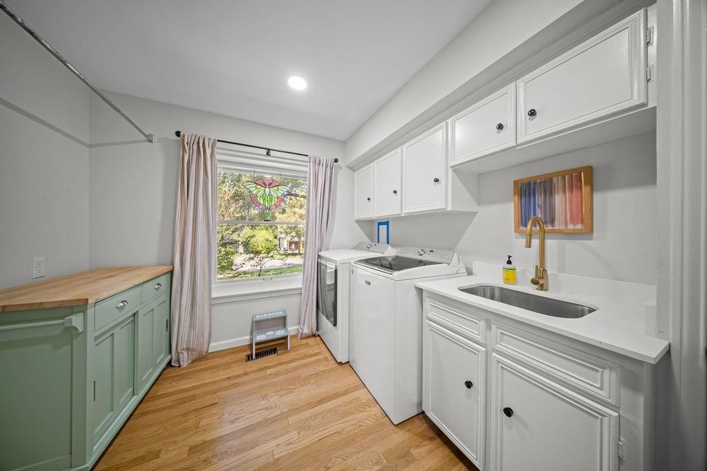 11714 El Hara Circle Dallas, TX 75230 - Photo 14 of 40 a kitchen that has a sink and a stove in it