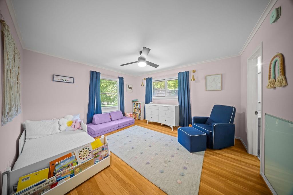 11714 El Hara Circle Dallas, TX 75230 - Photo 23 of 40 a bedroom with furniture and a window