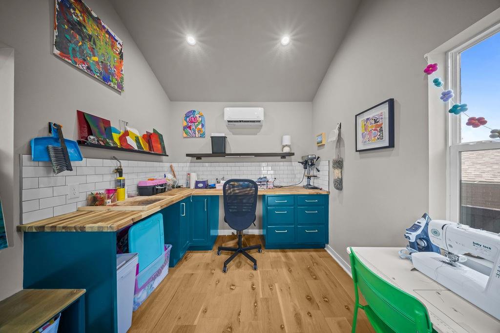 11714 El Hara Circle Dallas, TX 75230 - Photo 35 of 40 a bed room with a bed and a desk