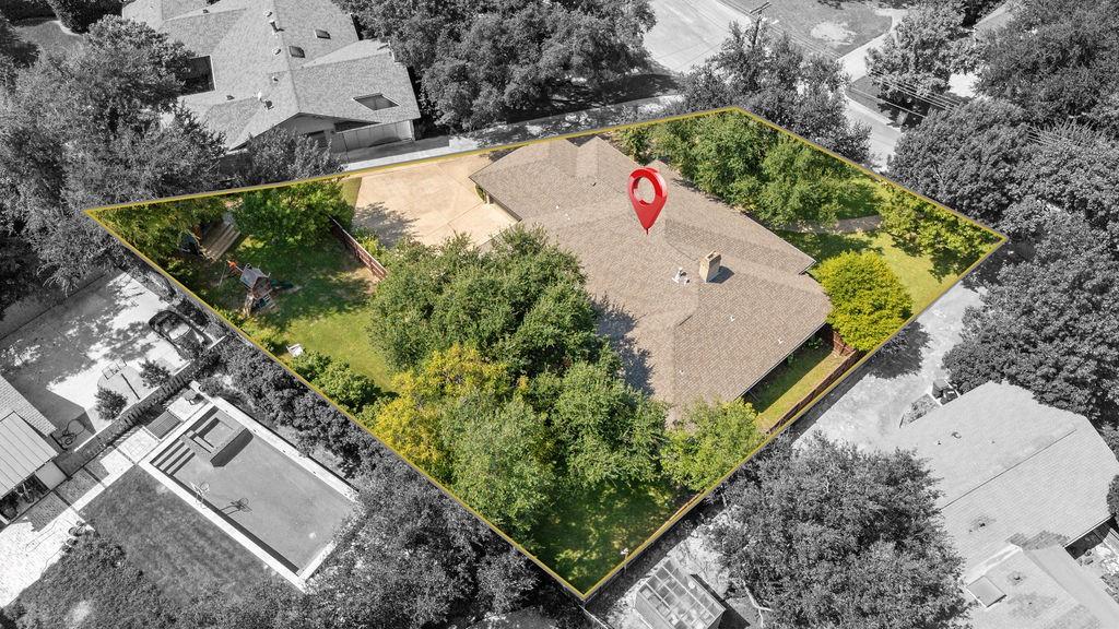 11714 El Hara Circle Dallas, TX 75230 - Photo 40 of 40 an aerial view of house with a yard