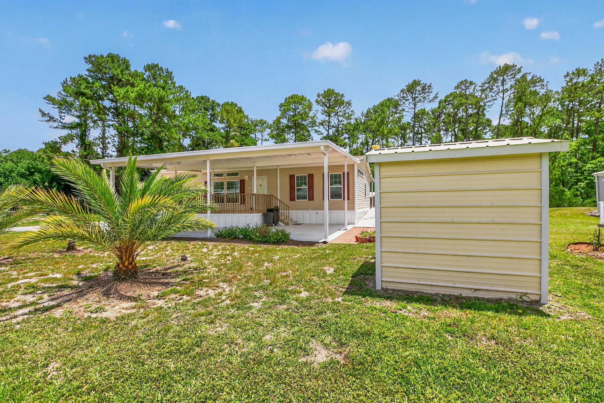 101 Trout Trail Crescent City, FL 32112 - Photo 2 of 45 front view of a house with a yard
