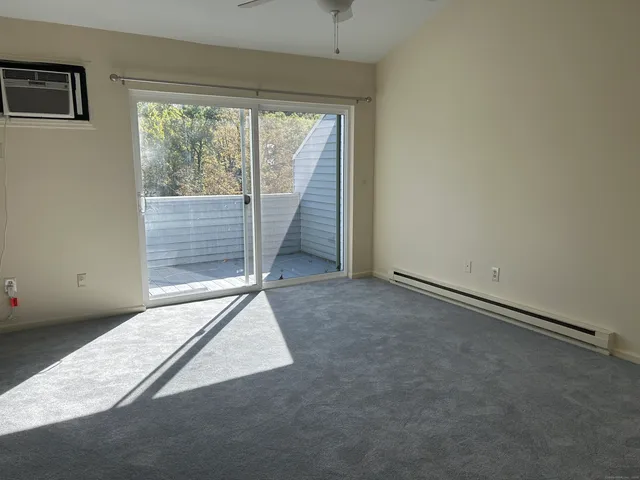 a kitchen with granite countertop a sink and cabinets