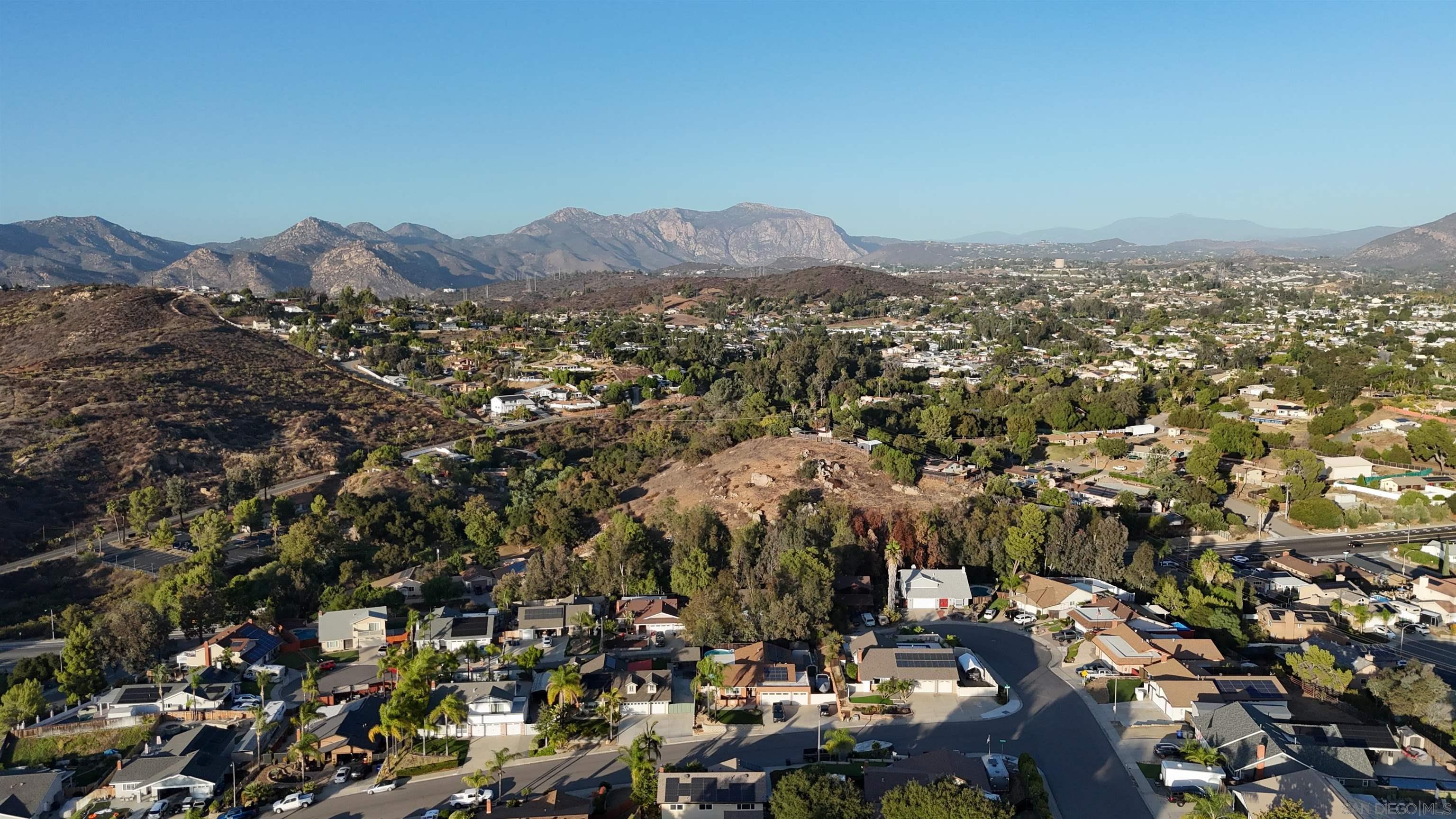 0 Los Coches Road, Unit 39706086 Lakeside, CA 92040 - Photo 5 of 22 an aerial view of residential house with parking and mountain view
