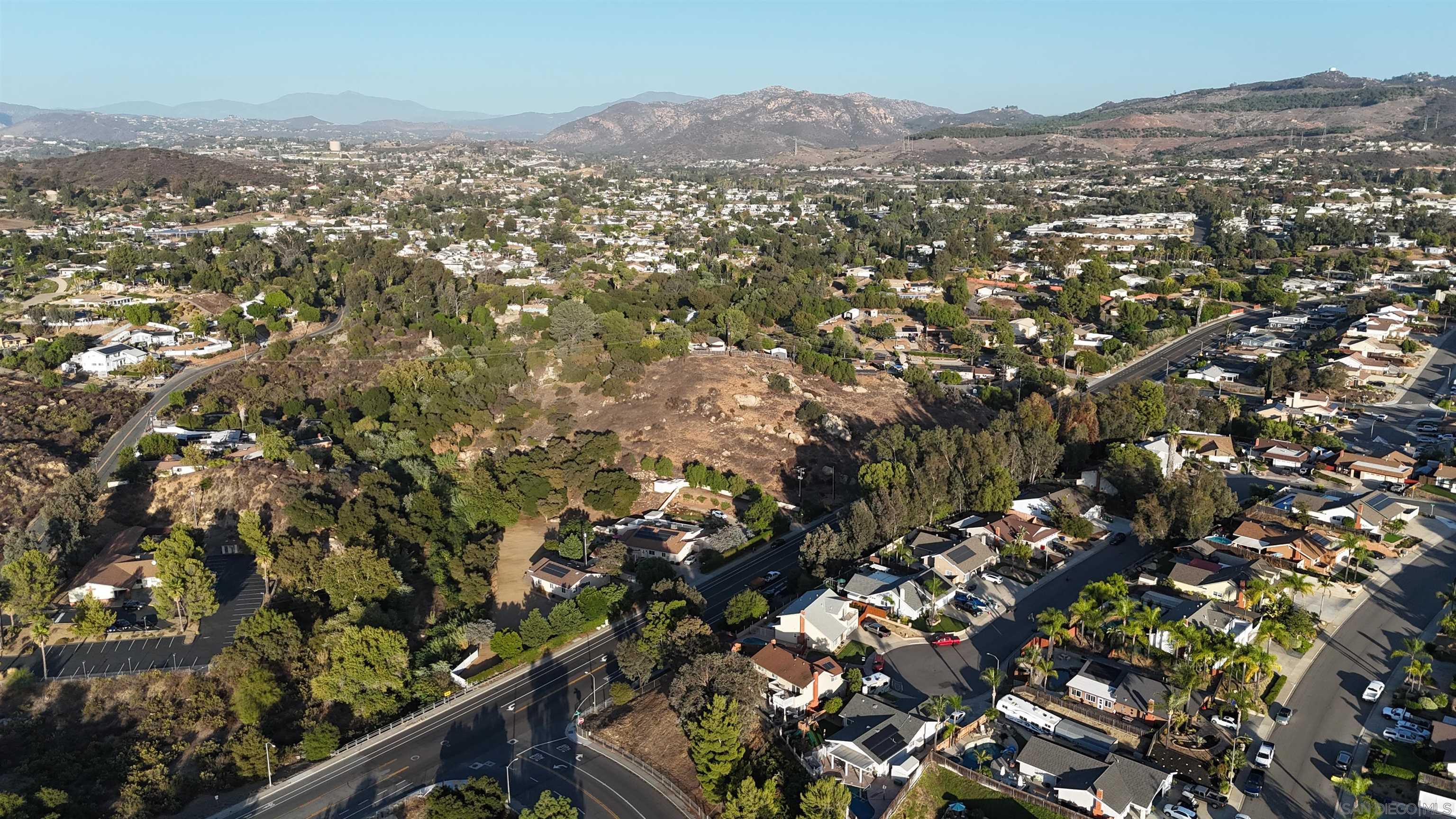 0 Los Coches Road, Unit 39706086 Lakeside, CA 92040 - Photo 8 of 22 an aerial view of residential houses with outdoor space and trees