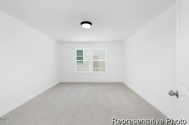 an empty room with a window