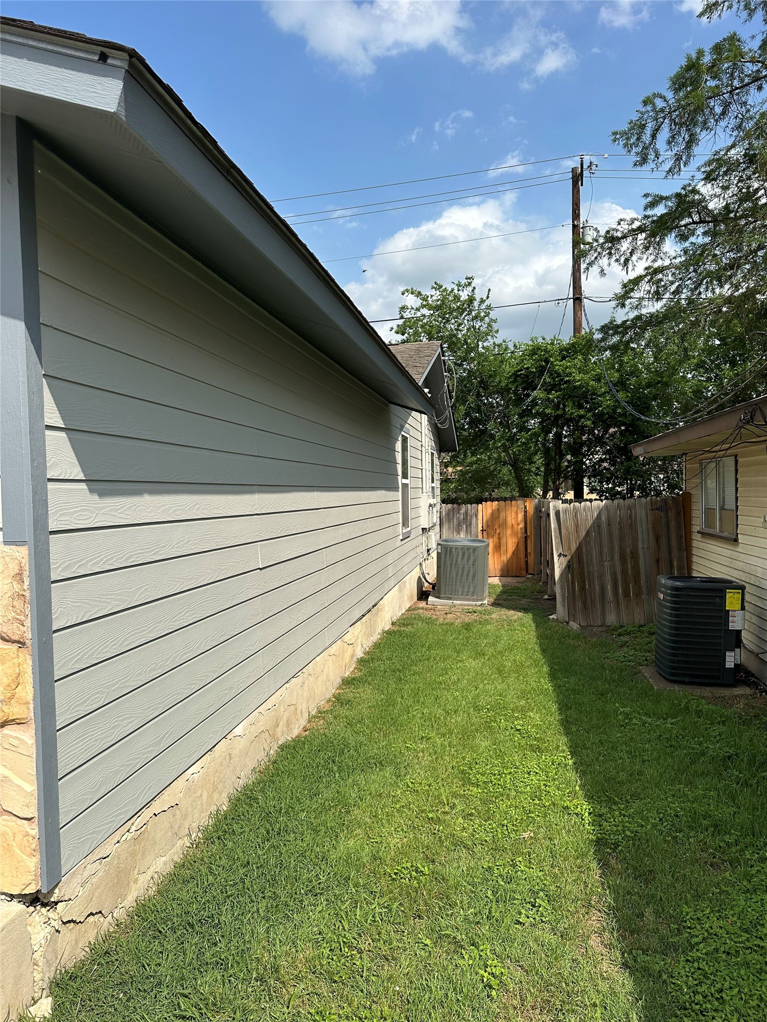 2743 Maple Tree Road, Unit A New Braunfels, TX 78130 - Photo 16 of 18 View of home's exterior with a cooling unit