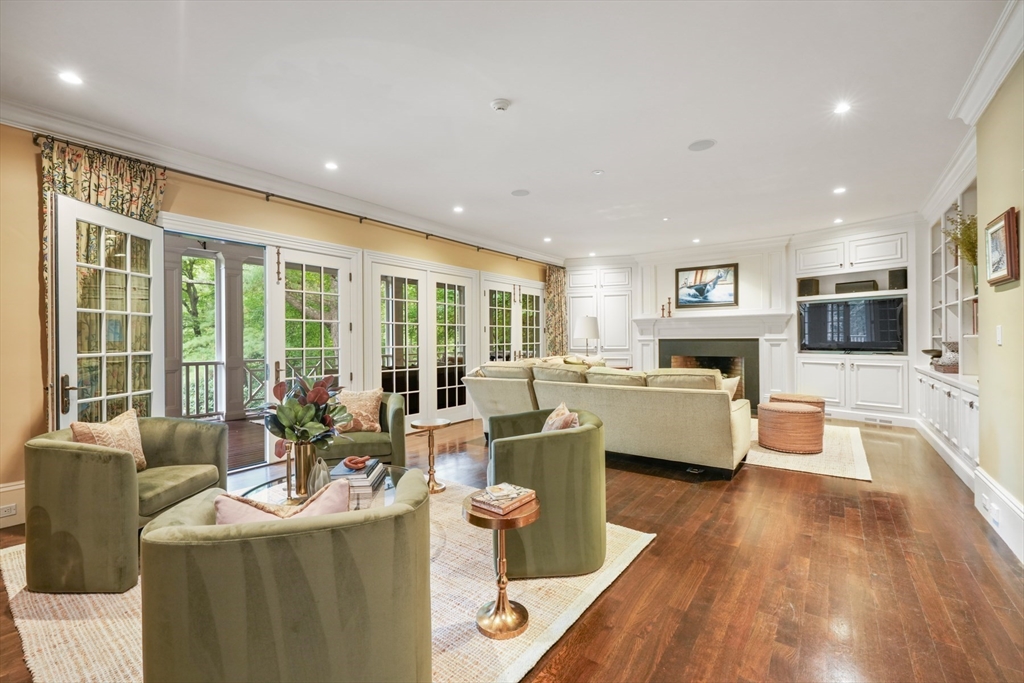 121 Livingston Road Wellesley, MA 02482 - Photo 11 of 42 a living room with furniture and a flat screen tv