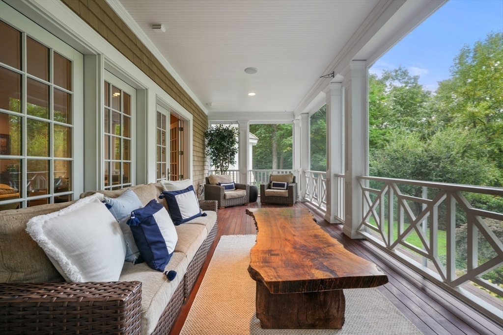 121 Livingston Road Wellesley, MA 02482 - Photo 13 of 42 a balcony with furniture and a potted plant